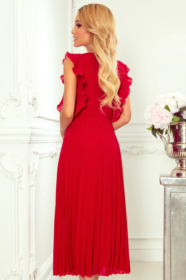 Raudona, plisuota suknelė su raukiniais ant pečių suteikia elegancijos ir moteriškumo. Suknelė puikiai tinka ypatingoms progoms, pabrėžiant figūrą ir suteikiant rafinuotumo.